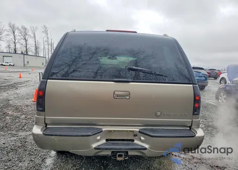 1999 Cadillac Escalade z USA, uszkodzony, nr VIN 1GYEK13R6XR410382